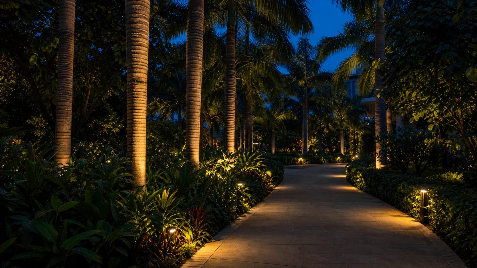 Evening garden landscape lighting with warm bollards, layered planting, and safe pedestrian circulation.